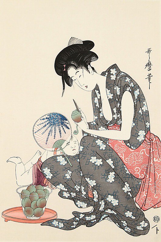 桃をむく母子